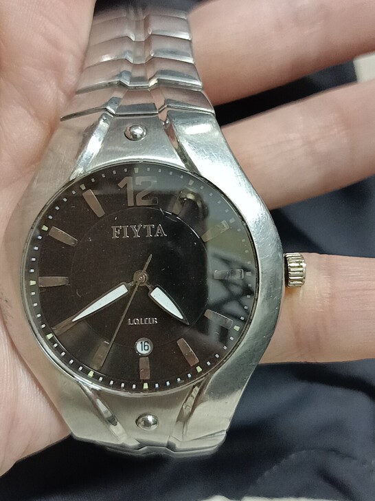 飞亚达石英男表，表把换过