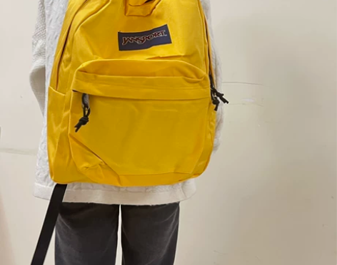 全新姜黄色Jansport杰斯伯正品双肩背...