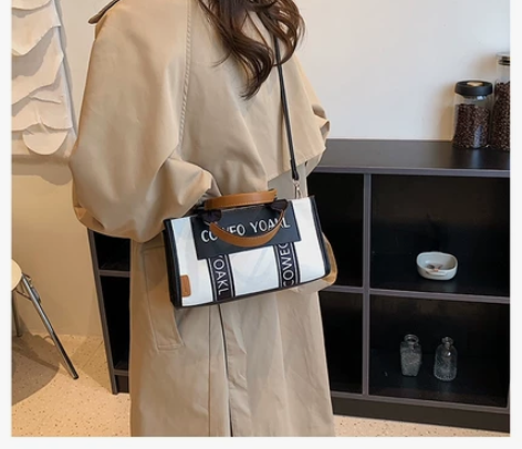 全新帆布包包，一次都没背过，低价售出！！！...