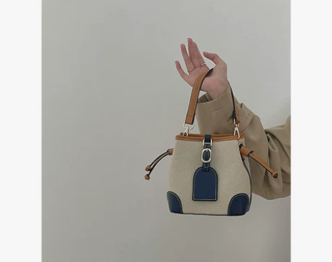 韩版手提撞色水桶包女夏季包包2021新款时...