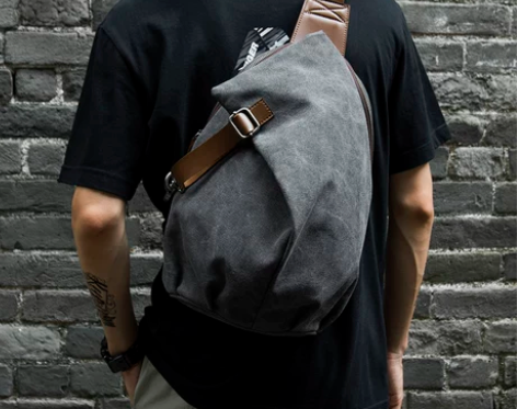 复古帆布单肩斜挎包男街头潮牌胸包简约旅行斜...
