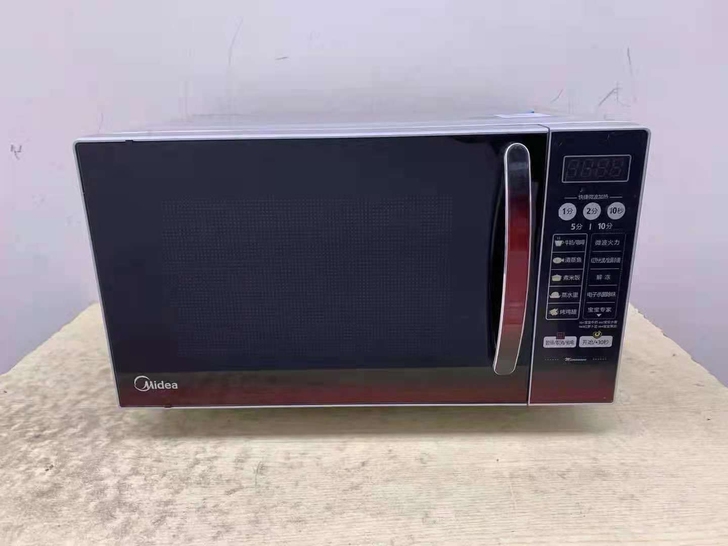 低价处理一台美的微波炉，九成新有盘几乎没有...