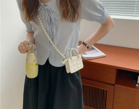 果柠莞尔 女士包珍珠斜挎包小香风 感兴趣的...