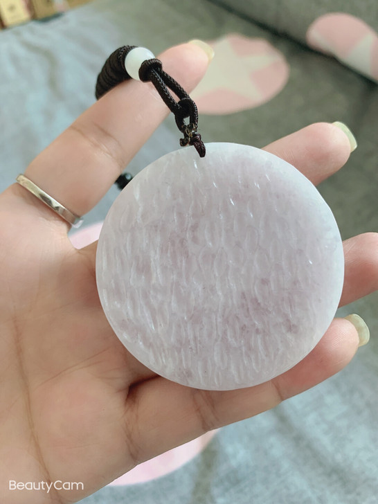 紫色翡翠原石，透手的哦，绳子还没有打开过，...