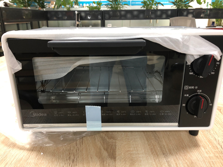 全新交通银行信用卡新人礼品送的美的电烤箱