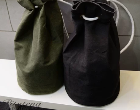 皮图腾篮球包帆布圆筒双肩包男抽绳束口袋水桶...