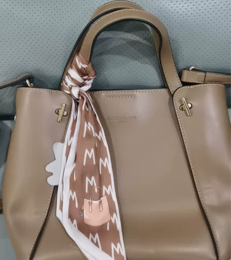 真皮女包 单肩包 手提包 头层牛皮  9成...