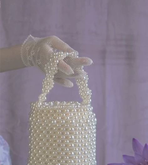 水桶珍珠包包仙女小众百搭复古斜挎包手提串珠...