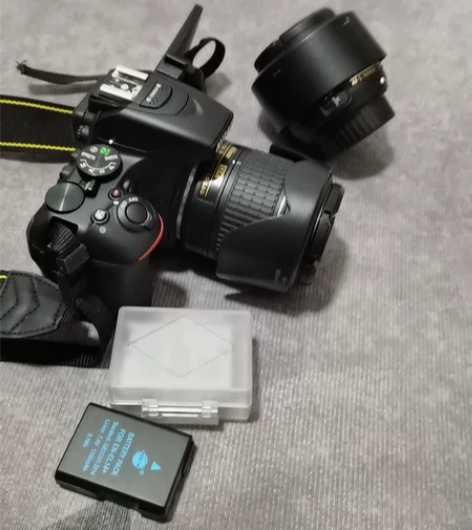 尼康D5600自己实体店买的，但是因为当时...