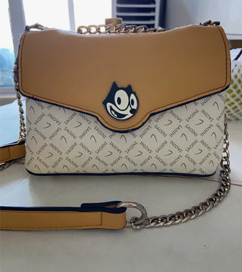 单肩斜挎手提包，颜色如图，实体箱包店99买...