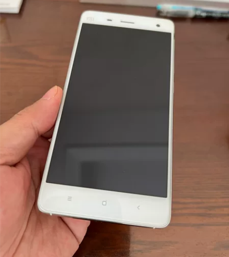 处理家中闲置手机 小米4 2+16G 外观...