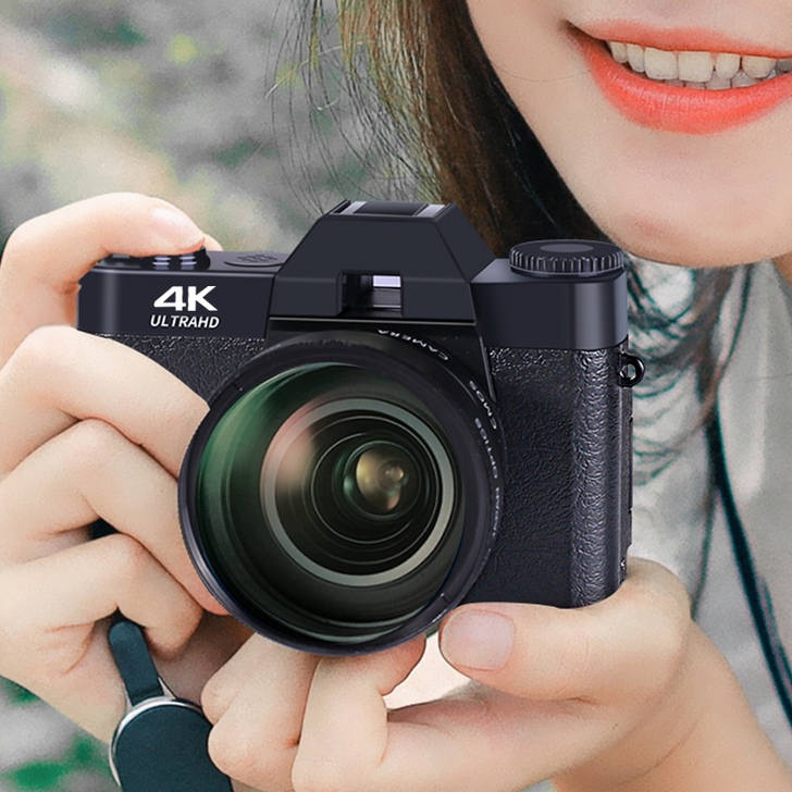 有两块电池，存储卡，读卡器，配微距镜头和广...