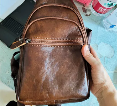 全新真皮棕色头层牛皮男士肩包胸包，保证牛皮...