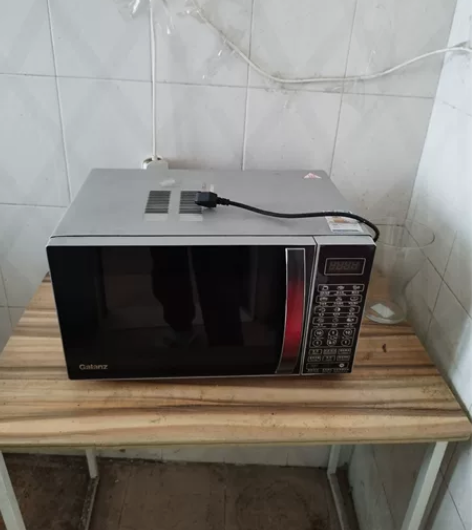 微波炉，正常使用，8新，功能正常，格兰仕光...
