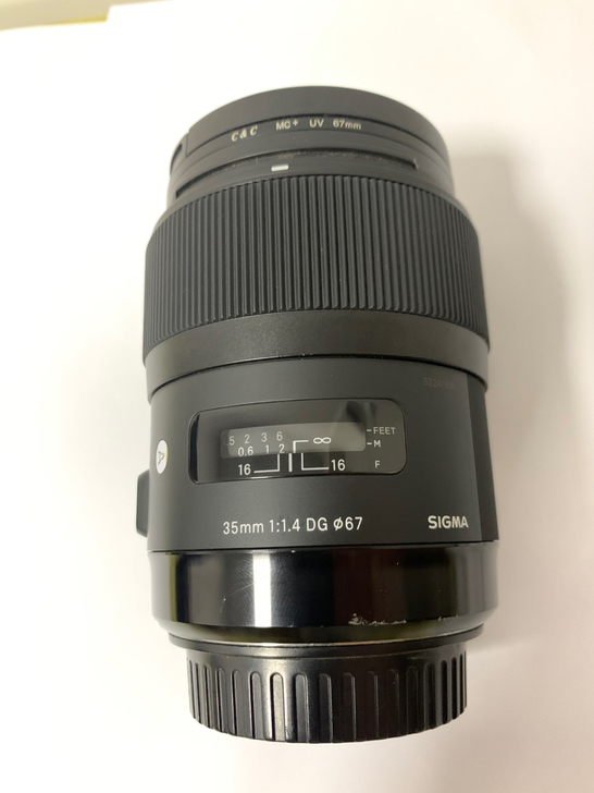 出适马35mm1.4自用佳能镜头,带一个保...