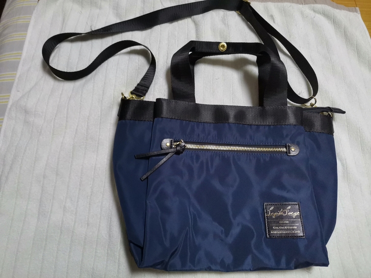 日式休闲包,藏青色,买来背过一两次,基本全...