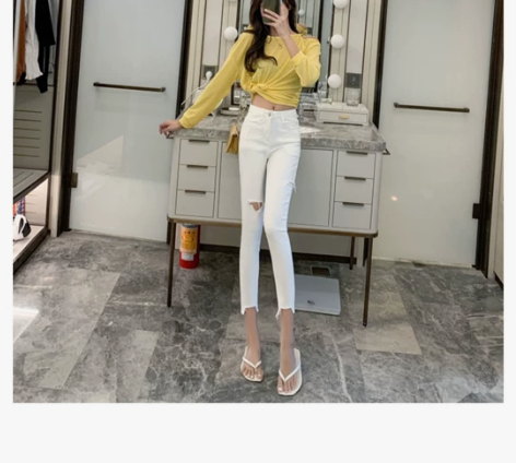破洞不规则高腰牛仔裤子女春秋修身显瘦紧身小...