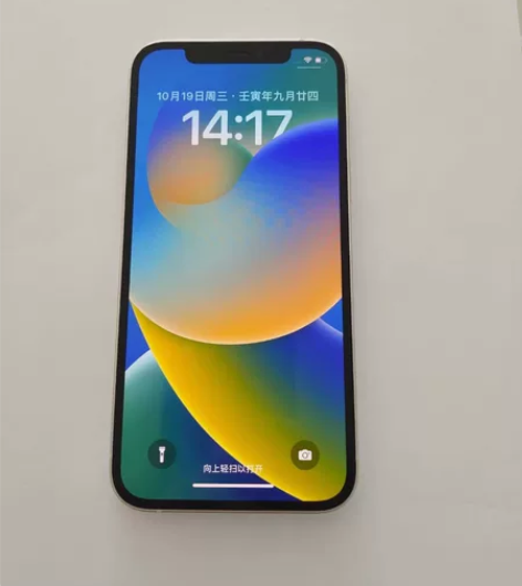 低价出一台自用苹果12手机（白色64g)无...