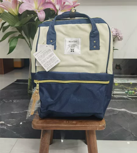 乐天anello双肩包中号帆布离家出走包男...