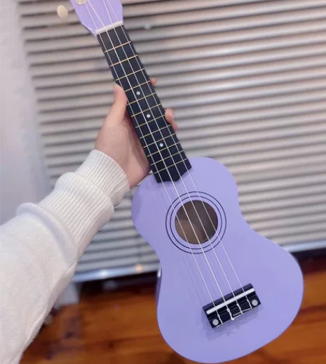 紫色尤克里里 全新90元 感兴趣的话点“我...