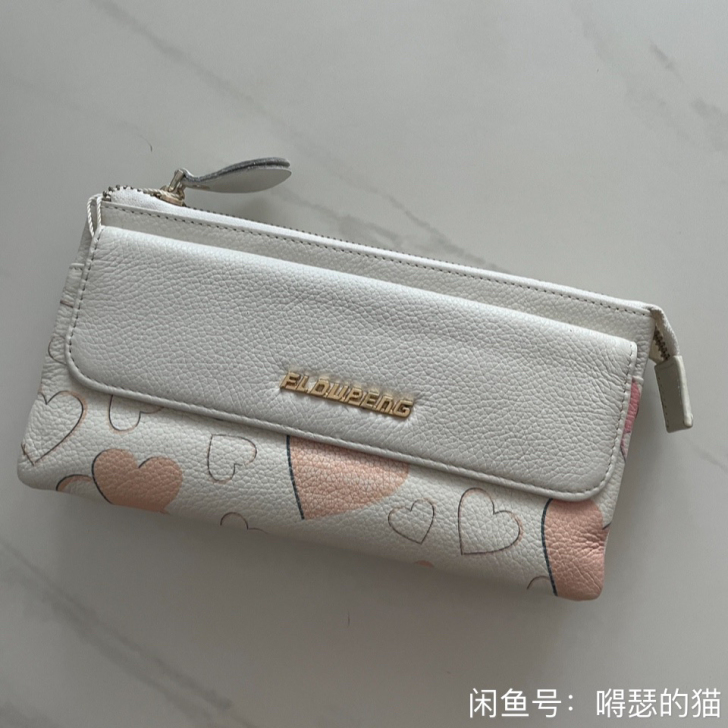39元包邮，全新（瑕疵包）真皮手拿包牛皮手...