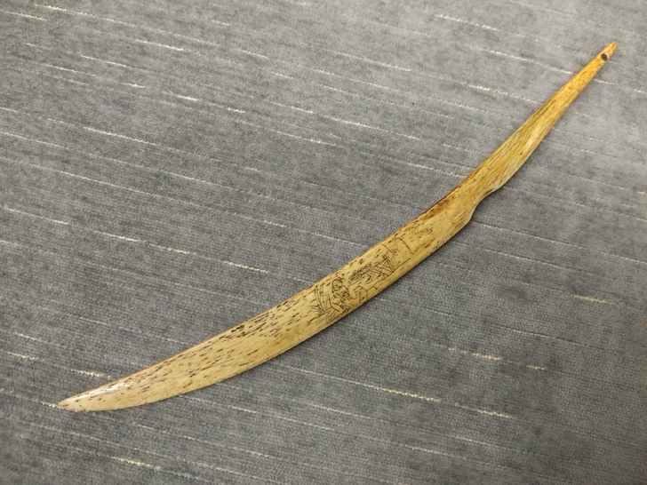 绩溪一退休领导 家购回此裁纸刀。造型优美 ...