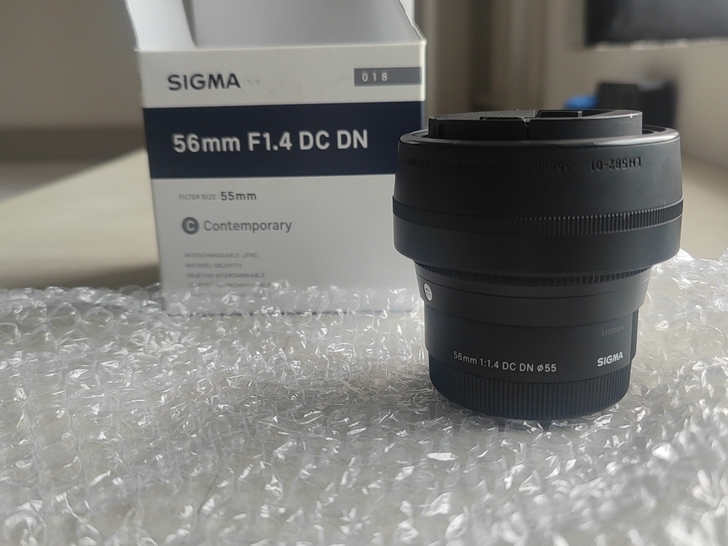 适马 56 1.4  保修卡未激活 箱说全...