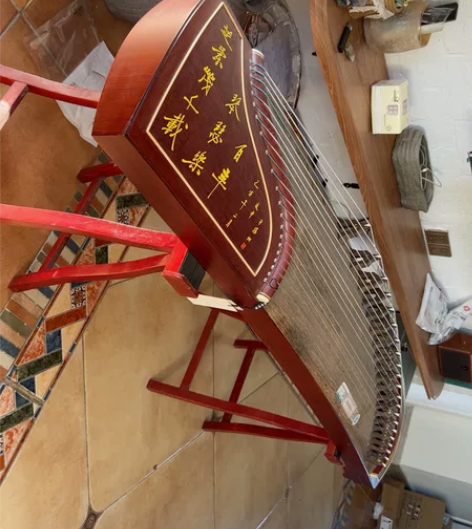 实体店买的龙凤牌古筝，原价4000左右，买...