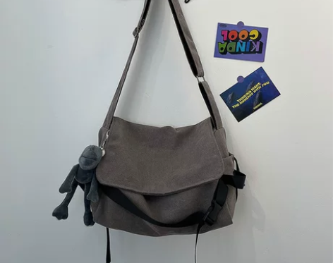 男帆布复古休闲斜挎包男士简约斜跨包旅行上课...