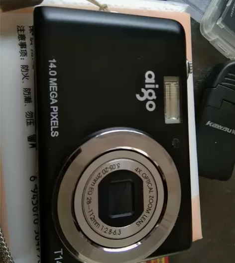 爱国者T1458九新。闲置。原厂相机包，充...