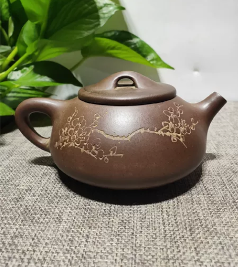 以前下乡时候收来的，“石飘”老紫砂壶一把，...