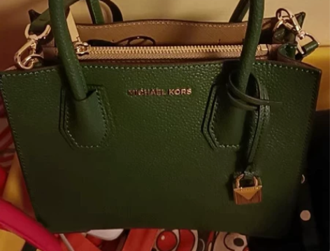 MK女包单肩斜挎手提拼色风琴锁头包merc...