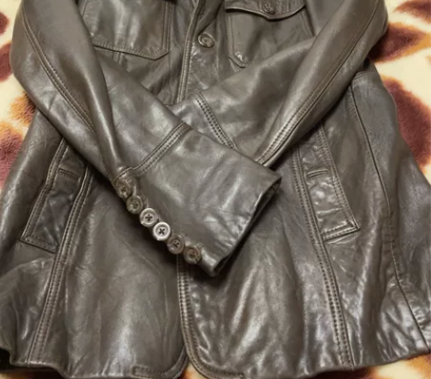 深咖啡色真羊皮休闲西装外套韩版修身男士，左...