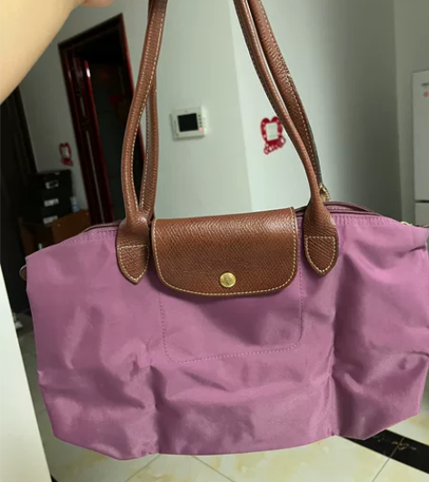 小号紫罗兰珑骧包，里面有点使用痕迹，但外面...