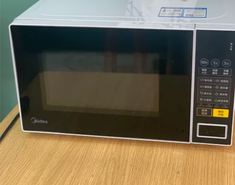 几乎全新自用美的微波炉PM2001 购入半...