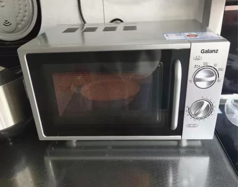 格兰仕机械加热平板式微波炉家用20升，机器...