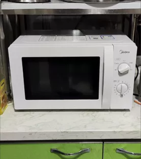 全新，美的微波炉，有200台处理 品牌美的...