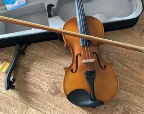 朋友送的1500买的4/4实木纯手工小提琴...