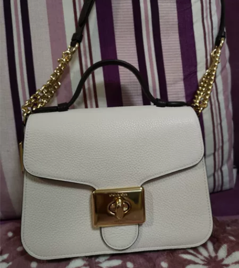 coach邮差包真皮蔻驰斜挎包单肩包翻盖斜...