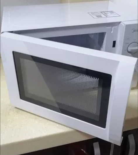 搬家急于出手！！几乎全新的美的微波炉，挺好...