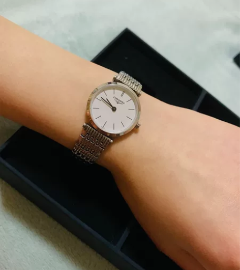 浪琴女士手表 时间教我,认真爱你浪琴,意思...