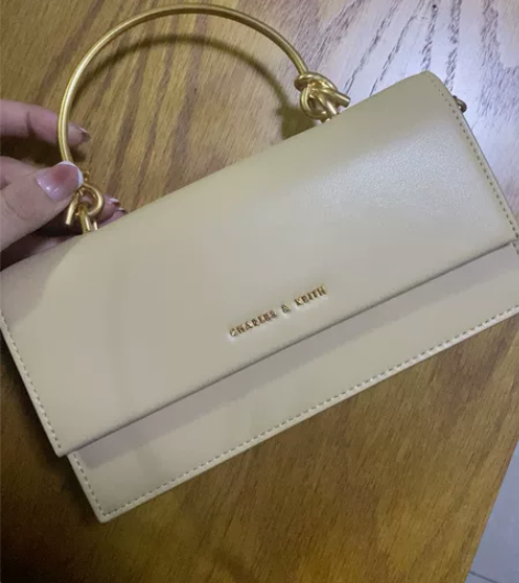 出正品小CK奶黄色手提包 可斜挎购买于金牛...