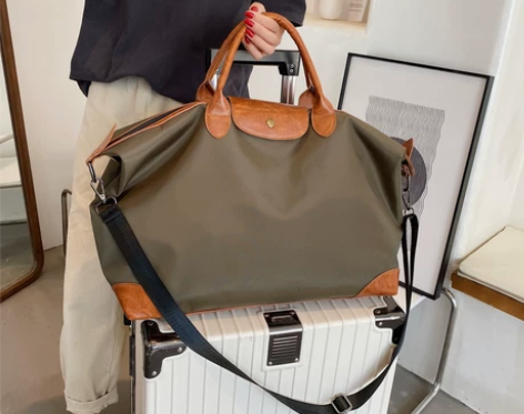 旅行包女大容量手提通勤包便携时尚撞色潮流待...