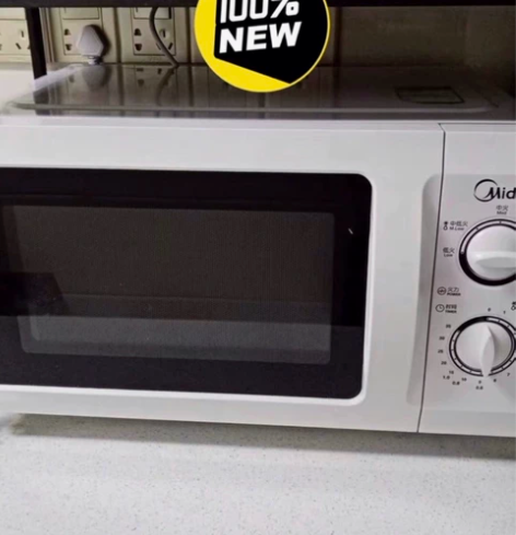 转让家用微波炉小型美的经典机械转盘20升微...