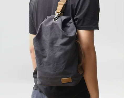 潮包简约日系文艺帆布胸包男时尚休闲斜跨水桶...