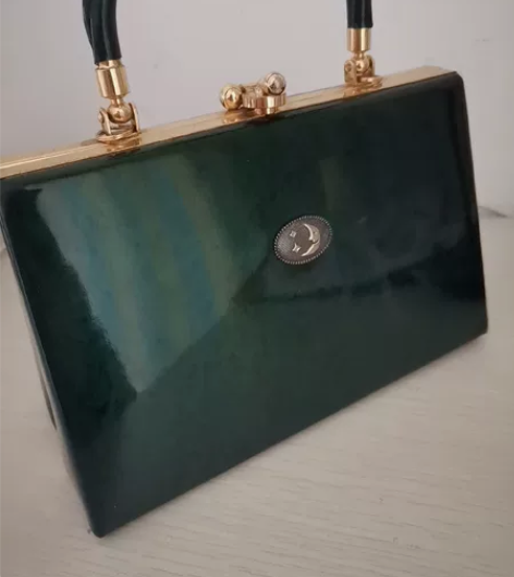 复古墨绿色手提包，典雅高贵气质有内涵。售出...