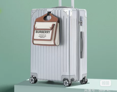 马冬强拉链行李箱26寸银色 一个拉链头掉了...