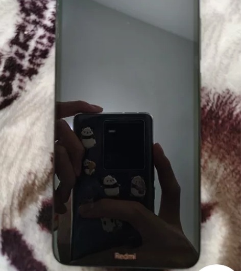 之前用的一台旧手机 红米7A 99新的 全...