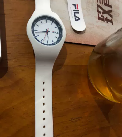 家里闲置一个石英运动手表 需要就拍,给邮费...