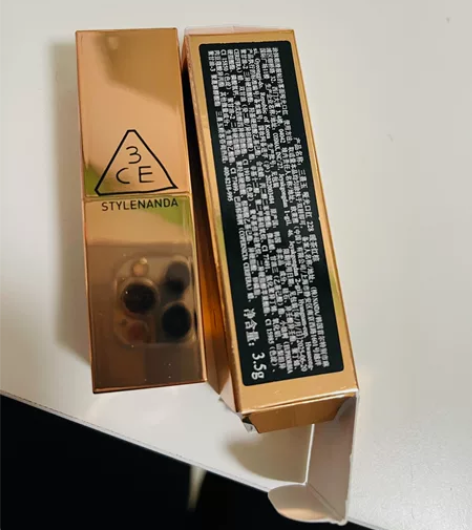 双十一刚到的 买唇釉送的正装口红番茄红22...